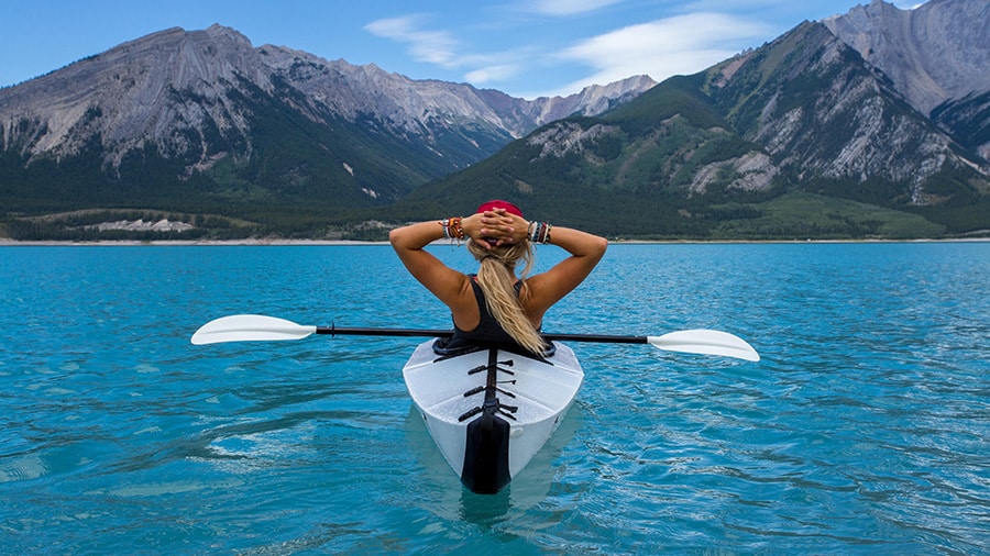 why magnesium feature image woman in kayak